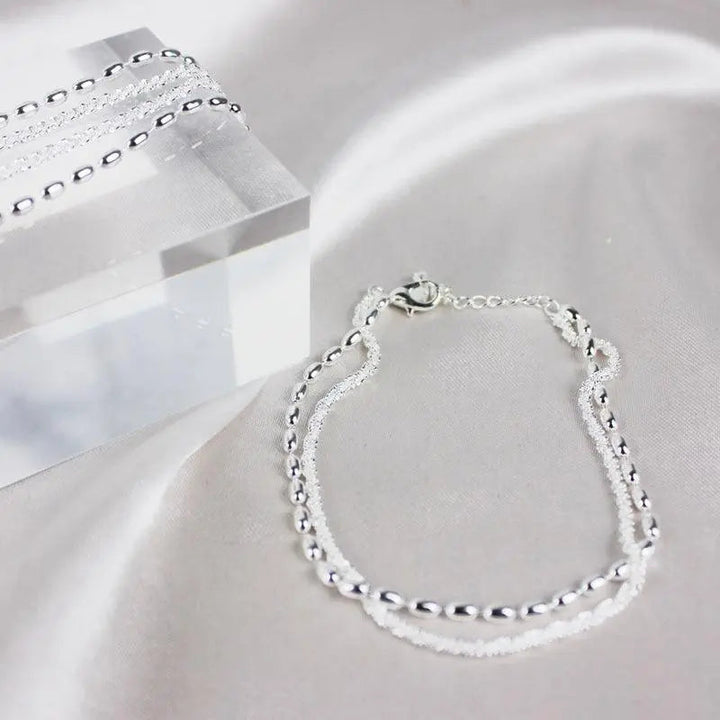 Elegant Silver Bracelet Set with Zirconia Stones