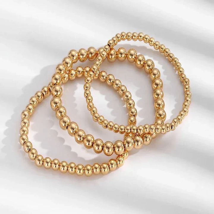 7pc Gold Beaded Bracelet Stack