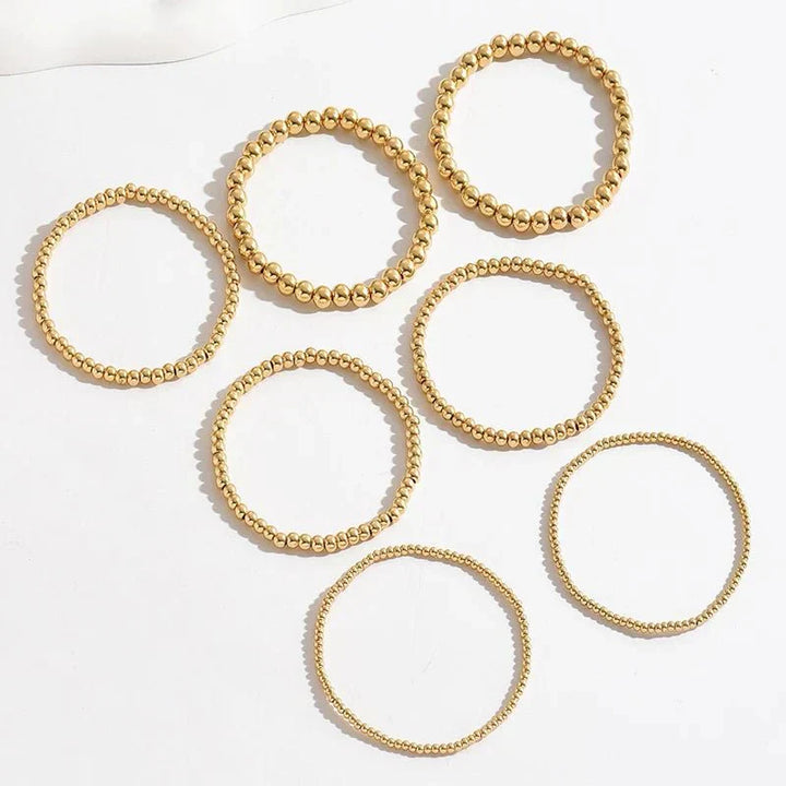 7pc Gold Beaded Bracelet Stack