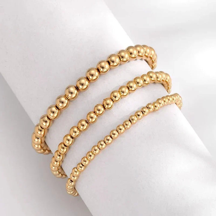 7pc Gold Beaded Bracelet Stack