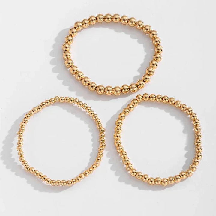 7pc Gold Beaded Bracelet Stack
